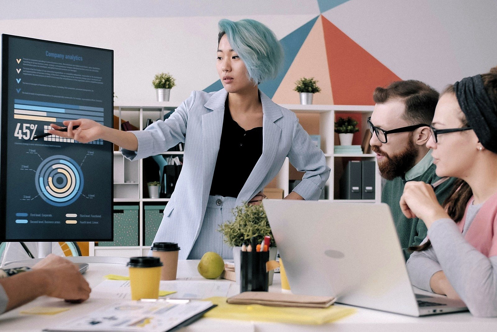 A team reviewing analytics on screen during an AI discovery session